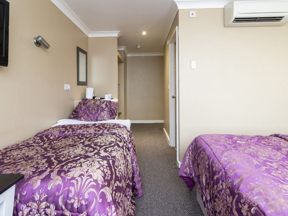 Stuart Hotel Standard Triple Room, Multiple Beds 3