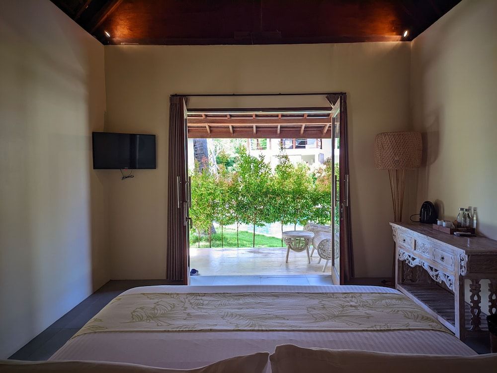 The Club Villas Lombok Deluxe Suite, 1 King Bed, Accessible, Pool View 7