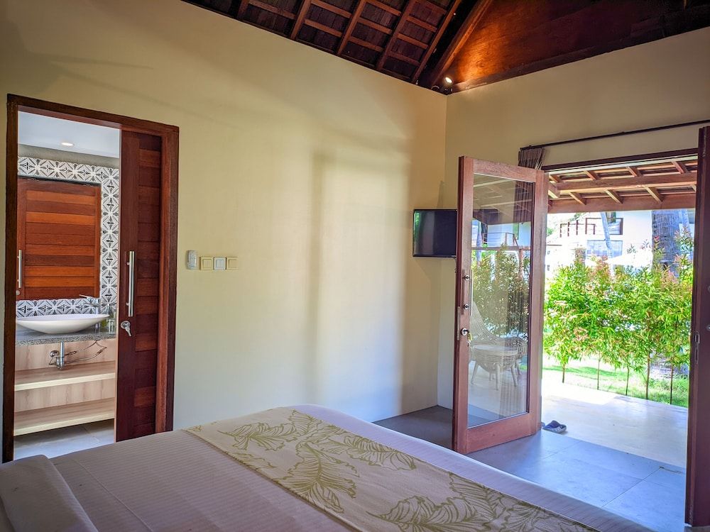 The Club Villas Lombok Deluxe Suite, 1 King Bed, Accessible, Pool View 6