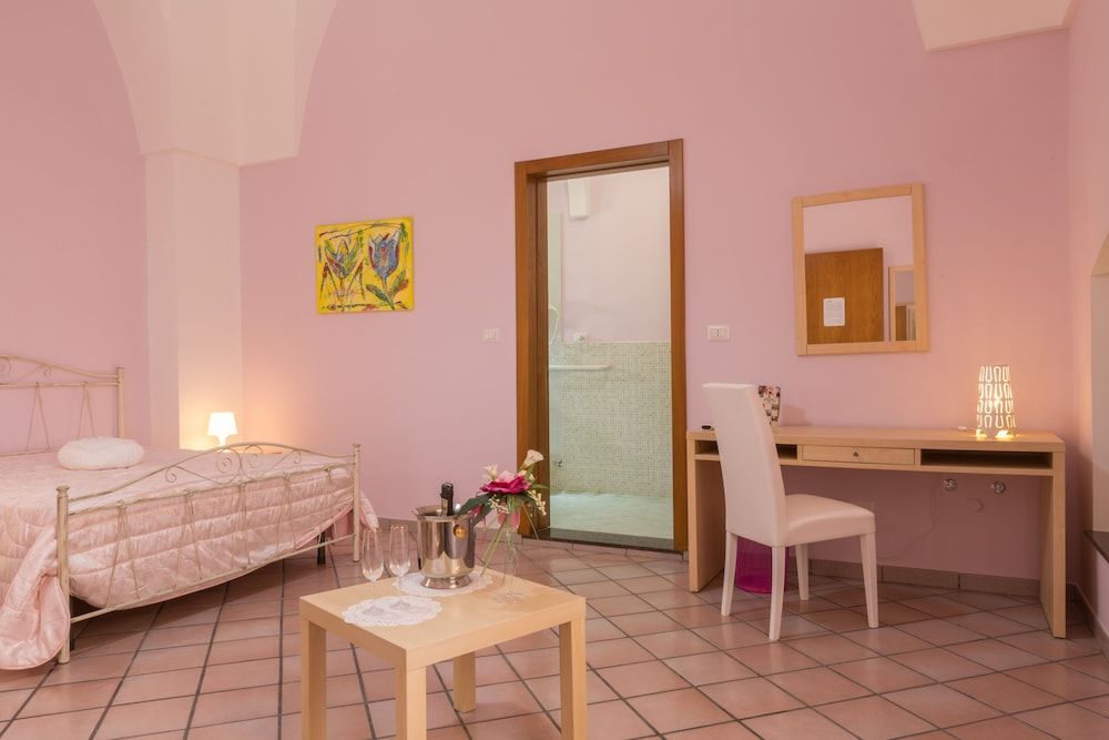 Le Dimore dei Messapi Deluxe Quadruple Room, Multiple Beds, Courtyard View (Rudhia) 3