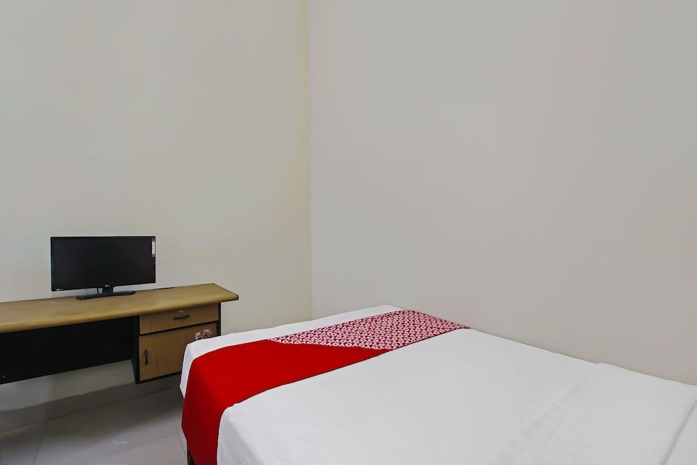 Super OYO 92437 Wahidin Guesthouse Family Suite 3