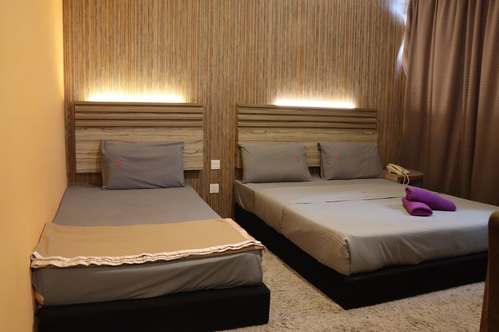 Classical Boutique Hotel Family Triple Room