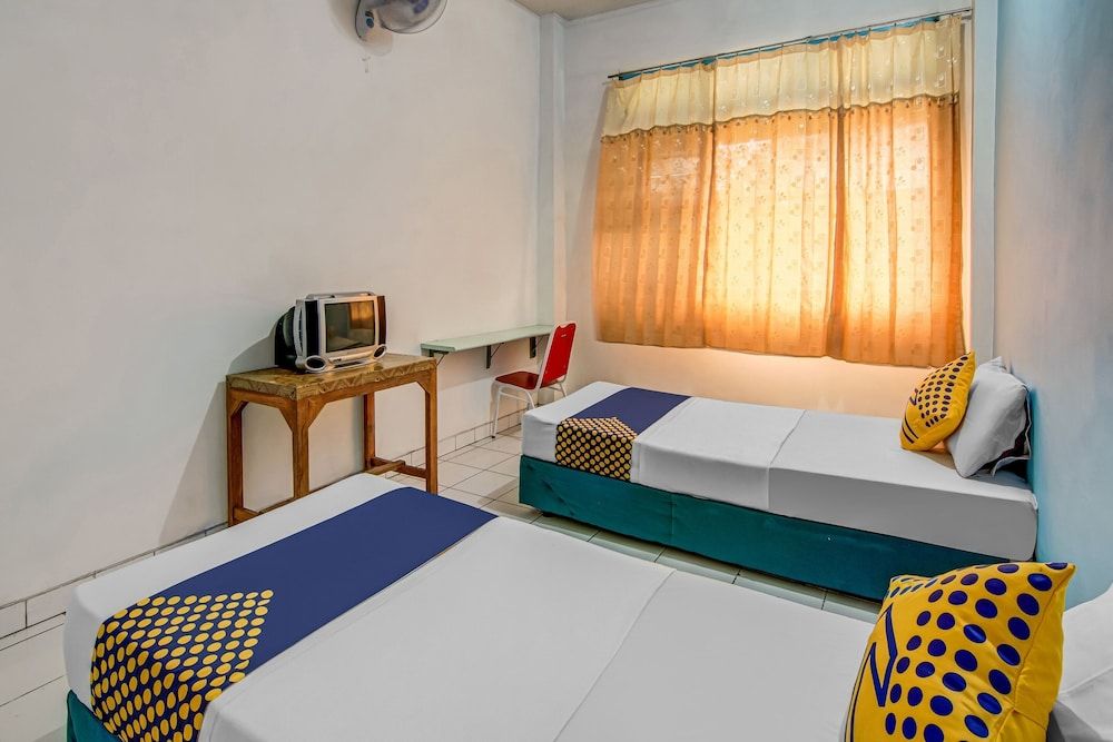 Spot ON 90964 Hotel Margadana Classic Twin Room 5