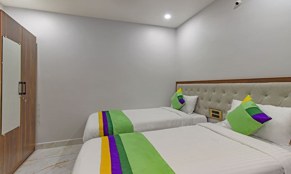 Treebo Abhi Suites, Guntur Standard Double Room 7