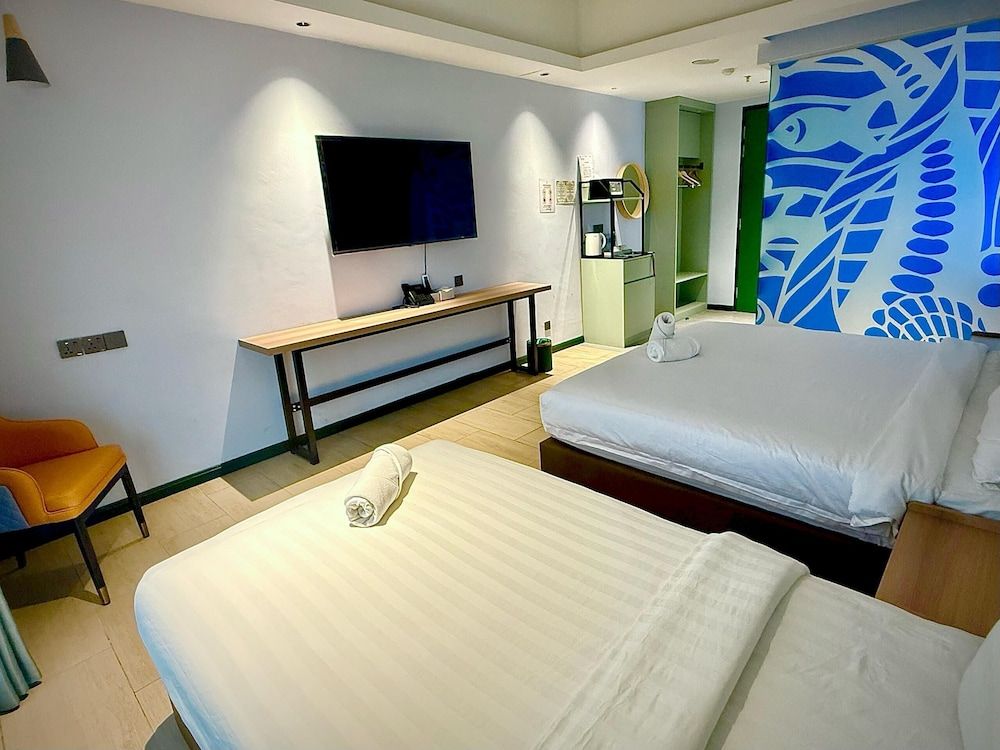 Wing Tat Grand Hotel Deluxe Double or Twin Room 3