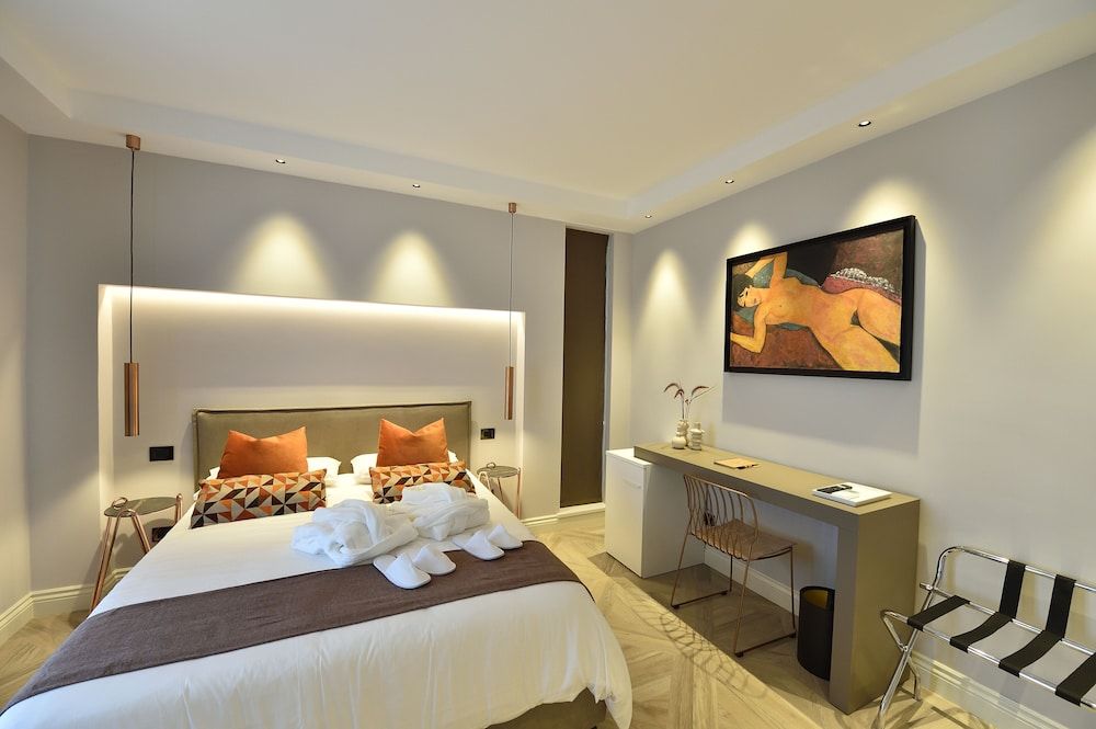 LA DEPENDANCE Deluxe Room