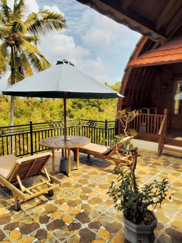 Sukawati Inn Deluxe Double Room, Garden View 8