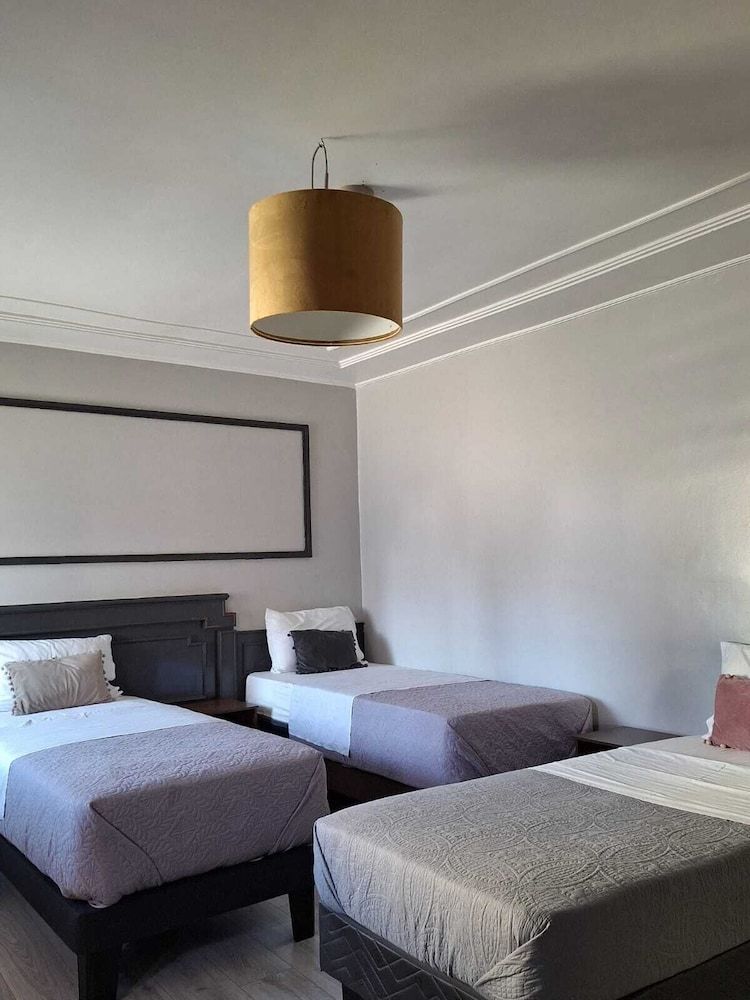 Grand Triple Room