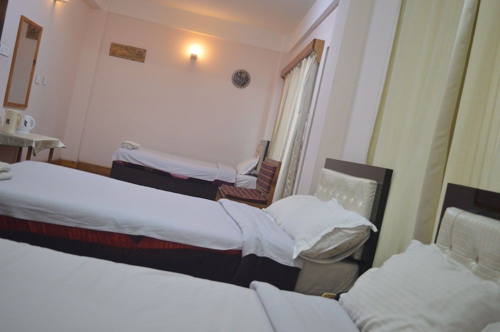 Bhutan Silverpine Resort Family Triple Room