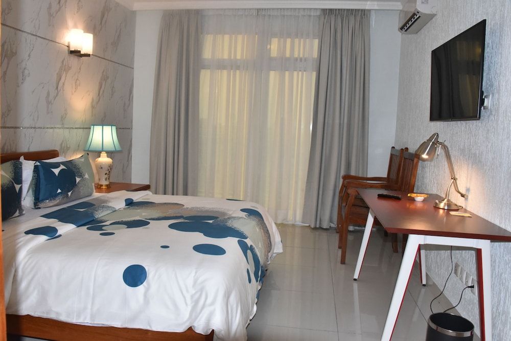 Adamaoua Grand Hotel City Luxury Room 4