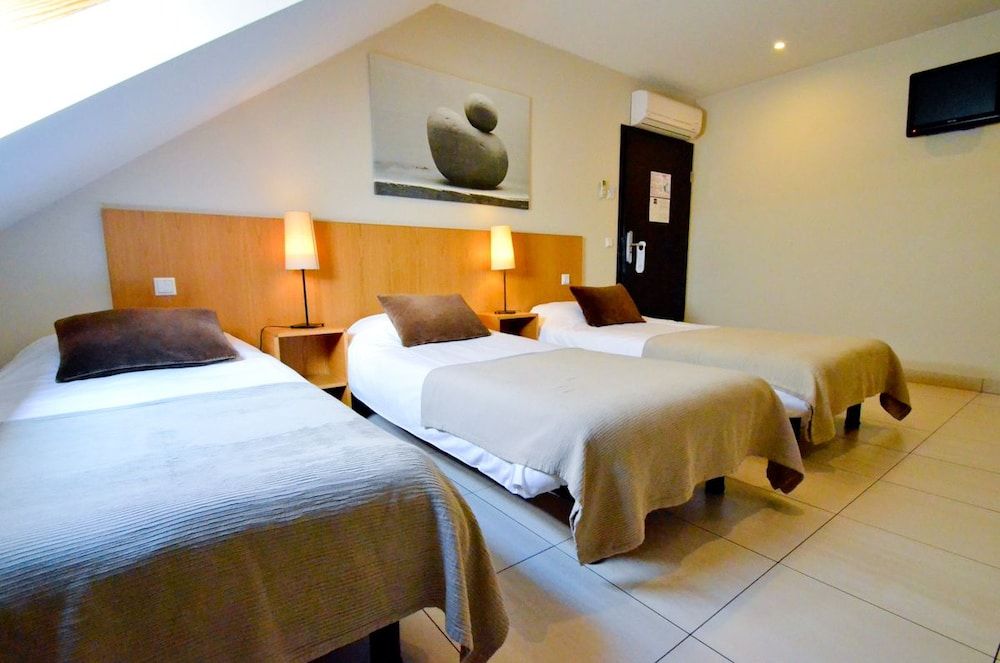 Hôtel Pax Triple Room 4