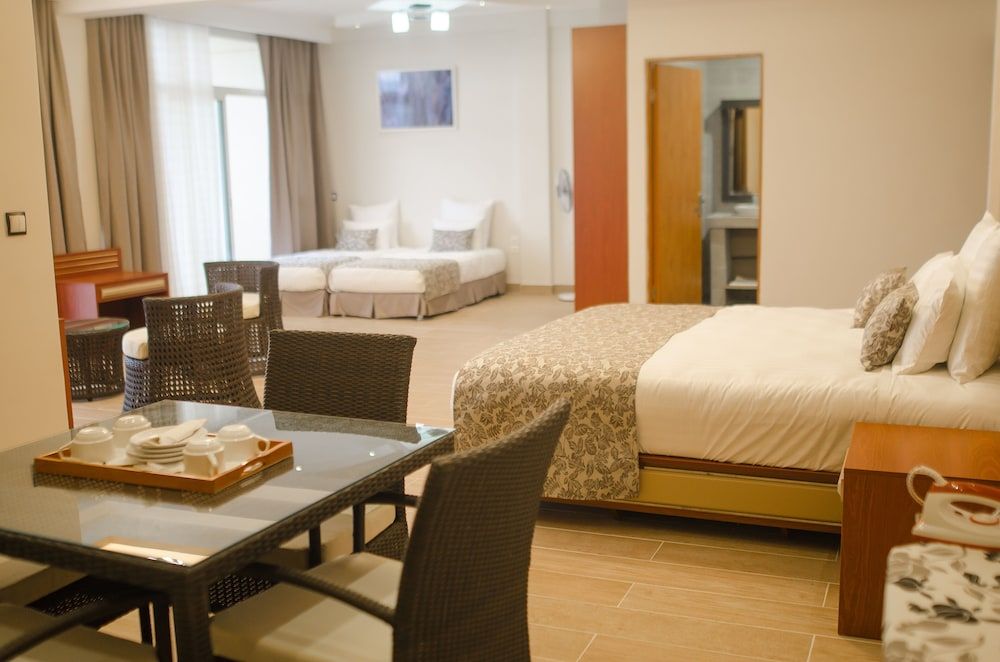 Menabe'l Deluxe Quadruple Room