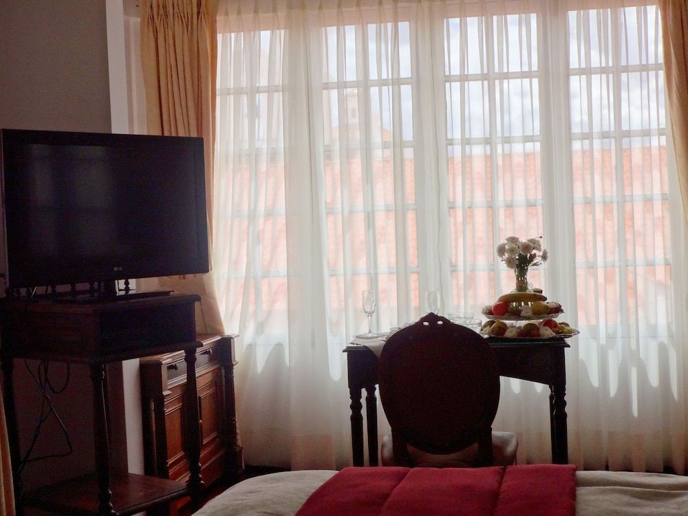 Hotel de Su Merced Deluxe Quadruple Room, 1 Bedroom, Private Bathroom, Courtyard View 5