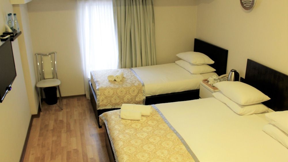 All Stars Hotel Family Triple Room, Multiple Beds, Private Bathroom, City View 5