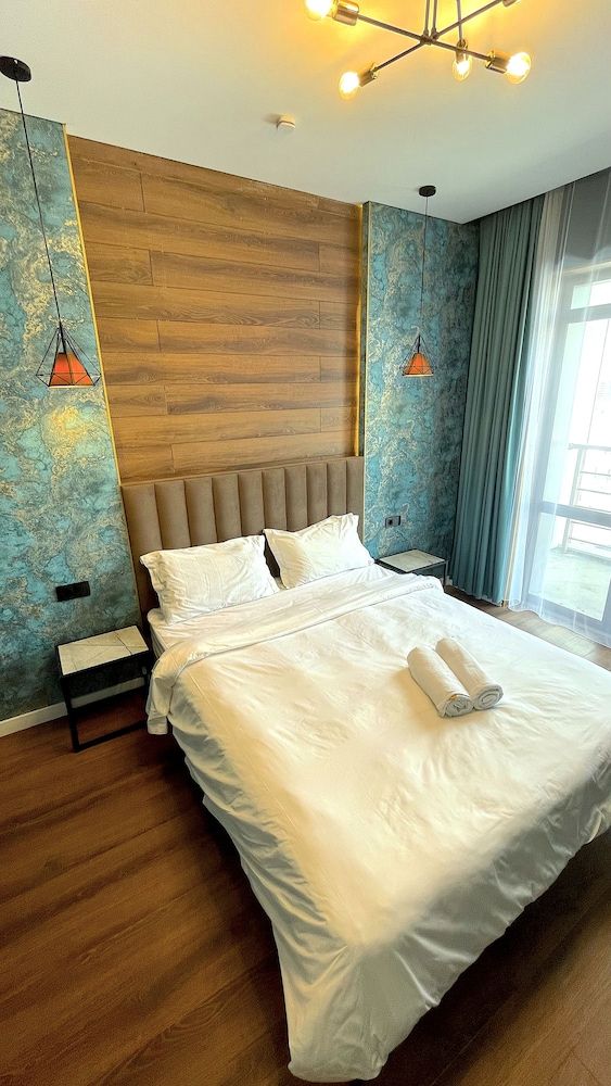 Prego apartments Almatau Design Studio, Refrigerator & Microwave 3