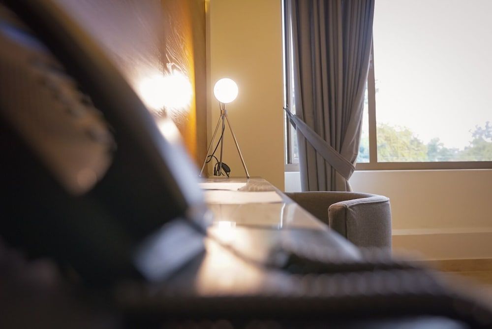 Roomy Signature Hotel Deluxe Double Room 12