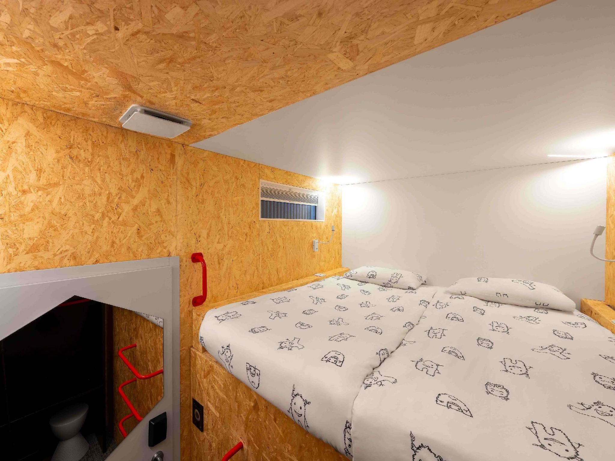 Double bed cabin, upper level with shared bathroom