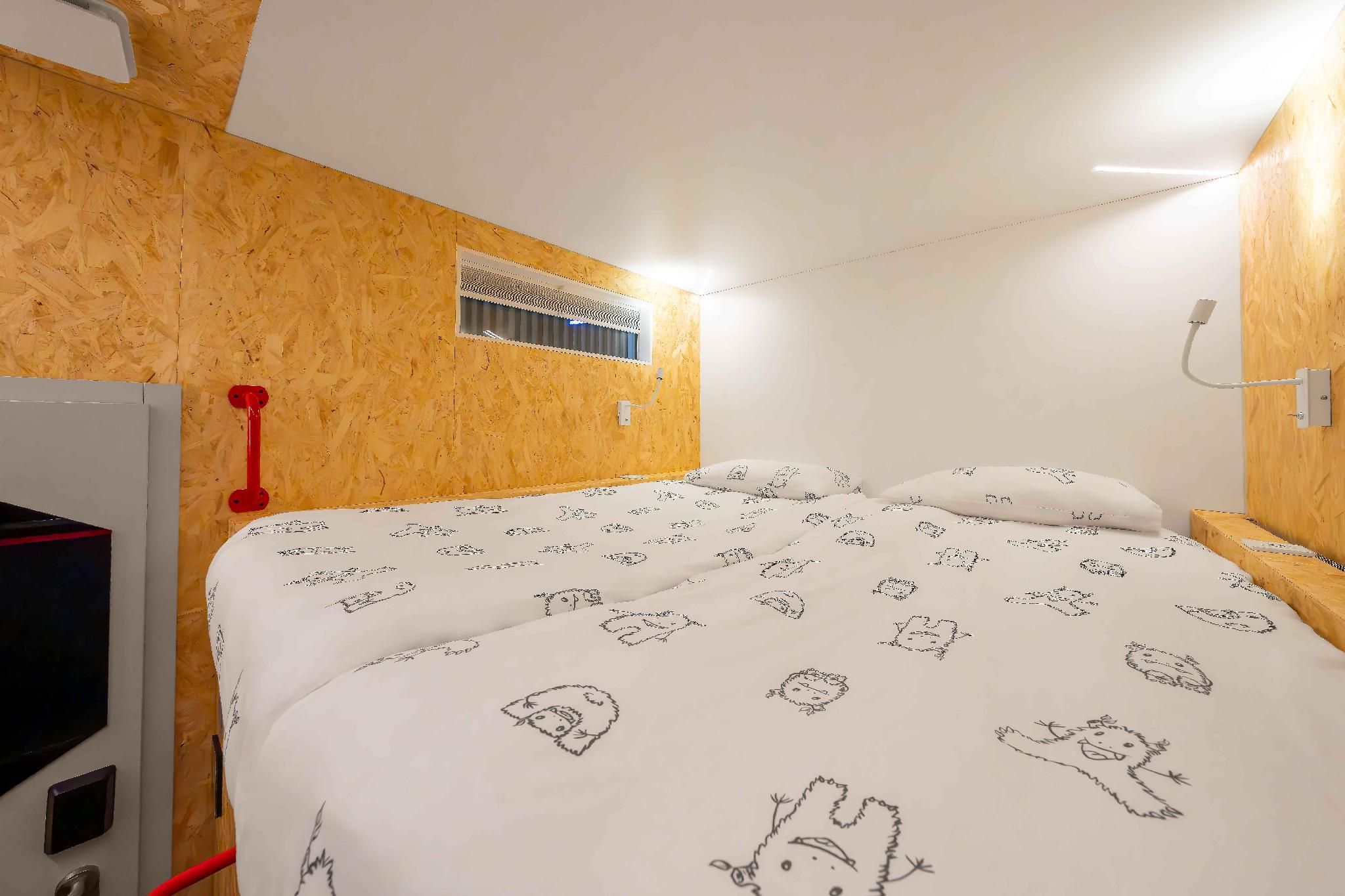 Double bed cabin, upper level with shared bathroom