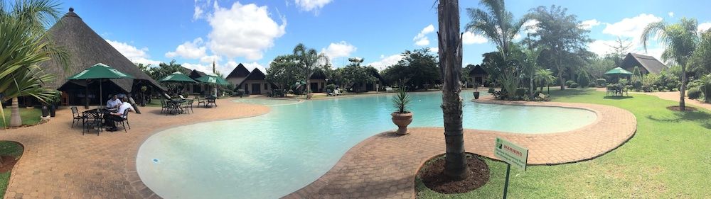 undefined Sandy's Creations Resort 9