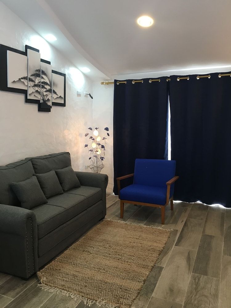 Suites Comfort Quadruple Room, 1 Bedroom 6