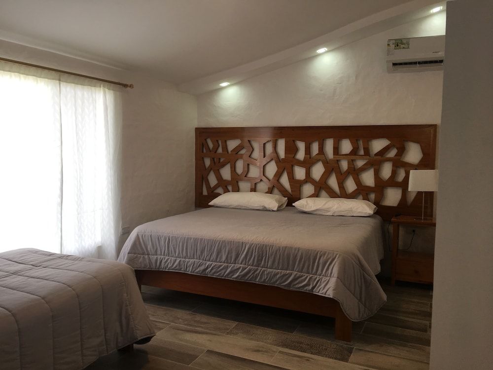 Suites Comfort Quadruple Room, 1 Bedroom 2