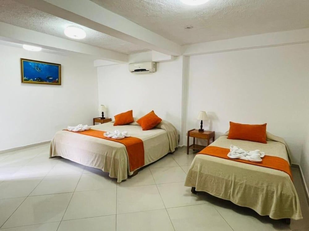 Fernandina Hotel & Spa Galápagos Family Double Room 3