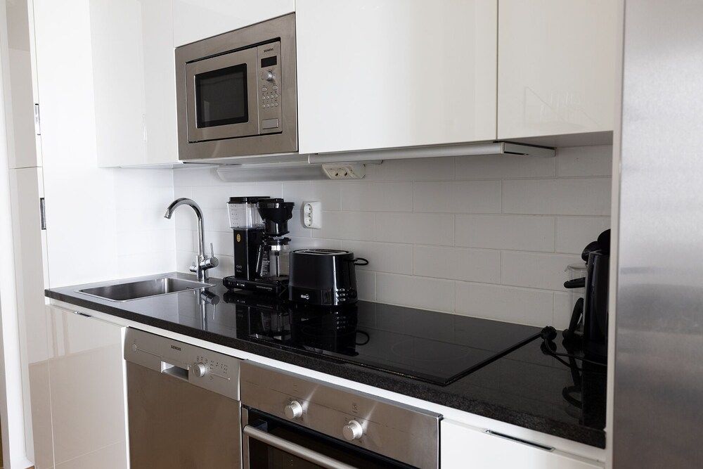 2ndhomes Central 1BR Apartment w Balcony Business Apartment 9