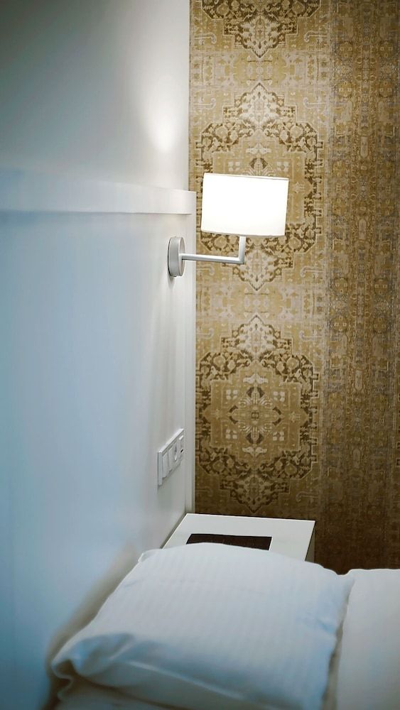 Epigraph town hotel Comfort Triple Room 8