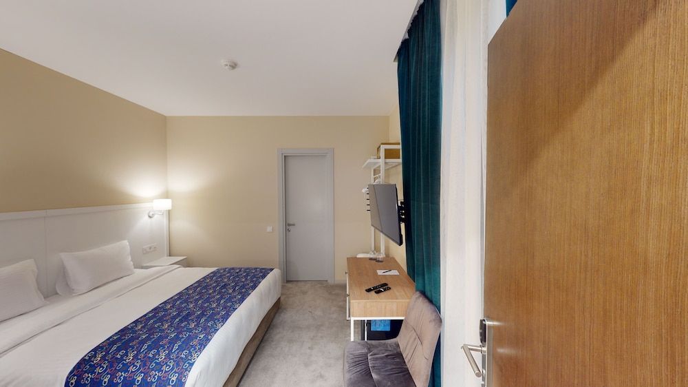 Epigraph town hotel Comfort Triple Room 4