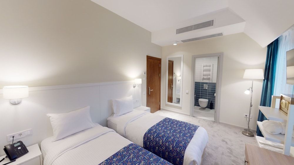 Epigraph town hotel Deluxe Double or Twin Room 7