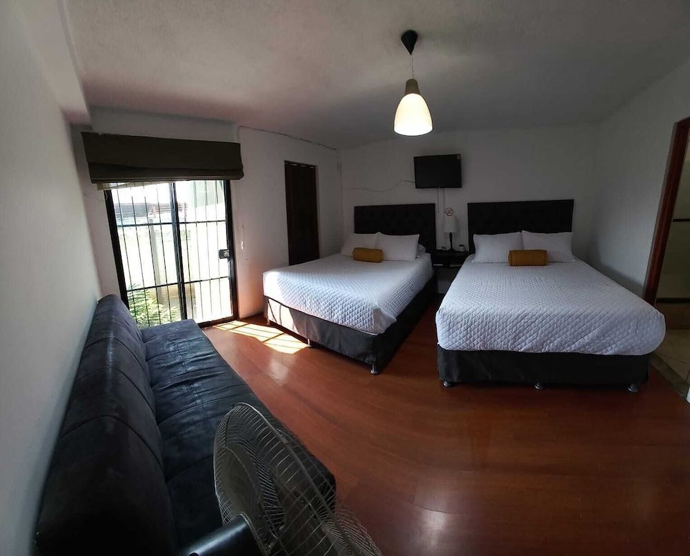 Standard Quadruple Room, Multiple Beds, Non Smoking, Private Bathroom