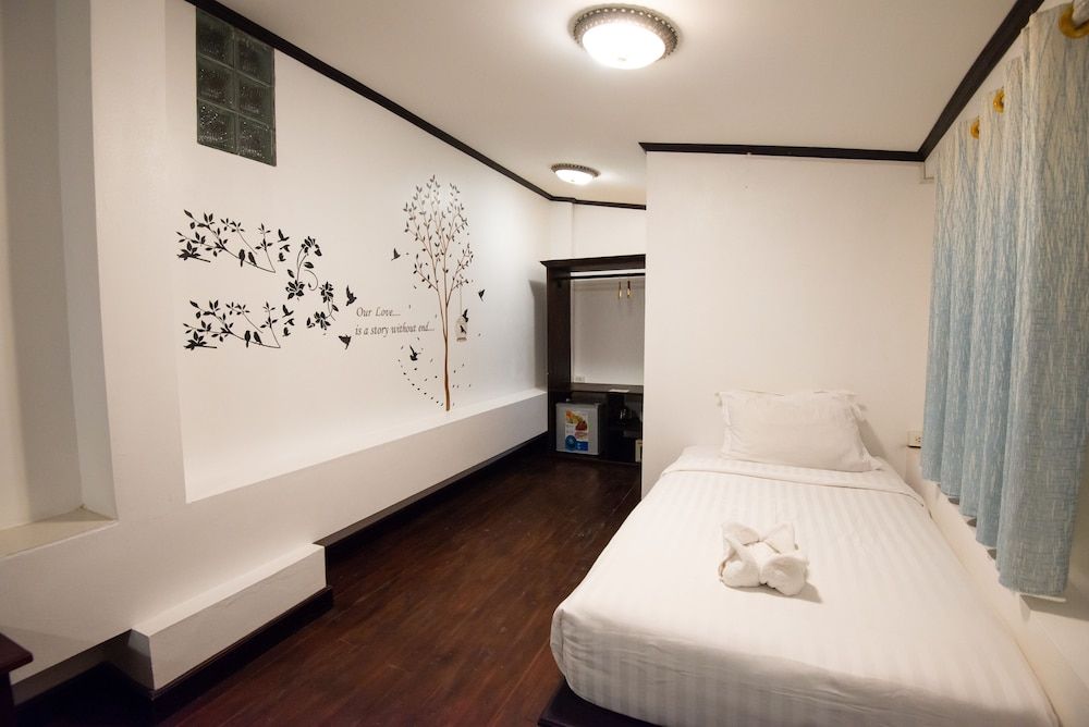 Jasmine Ville Guesthouse Deluxe Triple Room 2