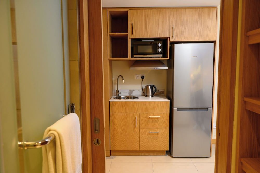 Ocean’s Creek Beach Hotel Mauritius Family Room, Kitchenette, Pool View 7