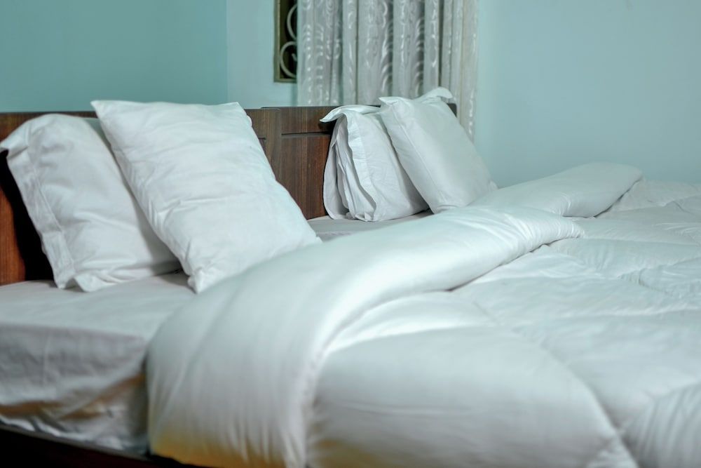 Faith Homes Hotel Deluxe Room 4