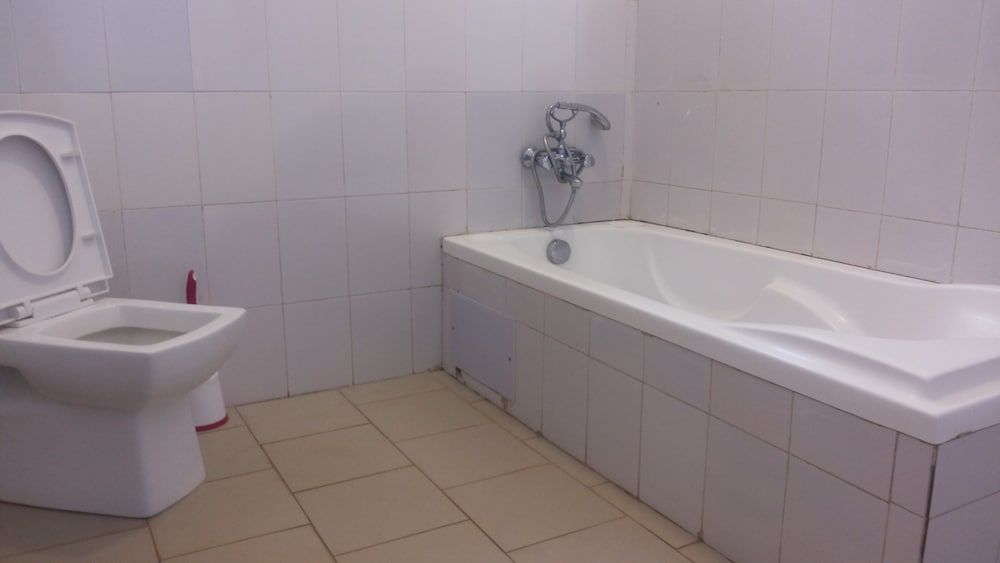 Global Friendship Hotel Deluxe Double Room 9