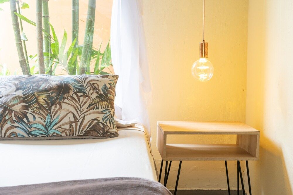 Hacienda Boutique Deluxe Quadruple Room 7