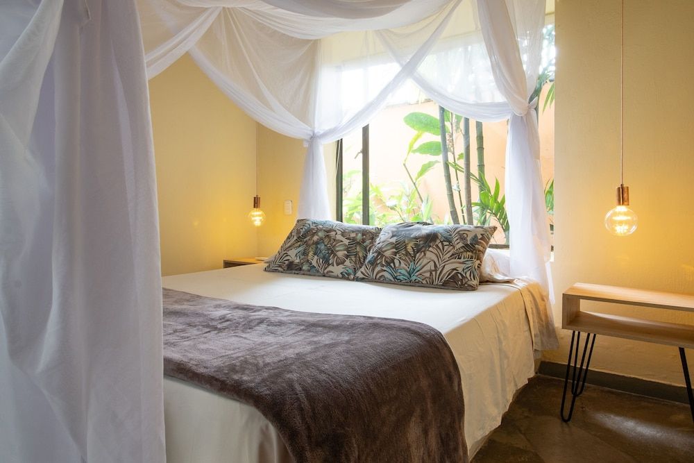 Hacienda Boutique Deluxe Quadruple Room