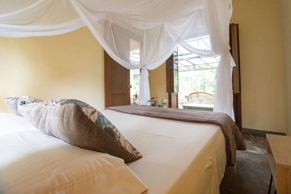 Hacienda Boutique Deluxe Quadruple Room 2