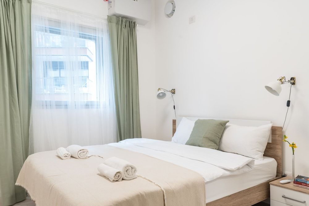 undefined Sunlit Urban Escape with Balcony by Sea N Rent 9