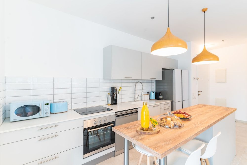 undefined Sunlit Urban Escape with Balcony by Sea N Rent 5
