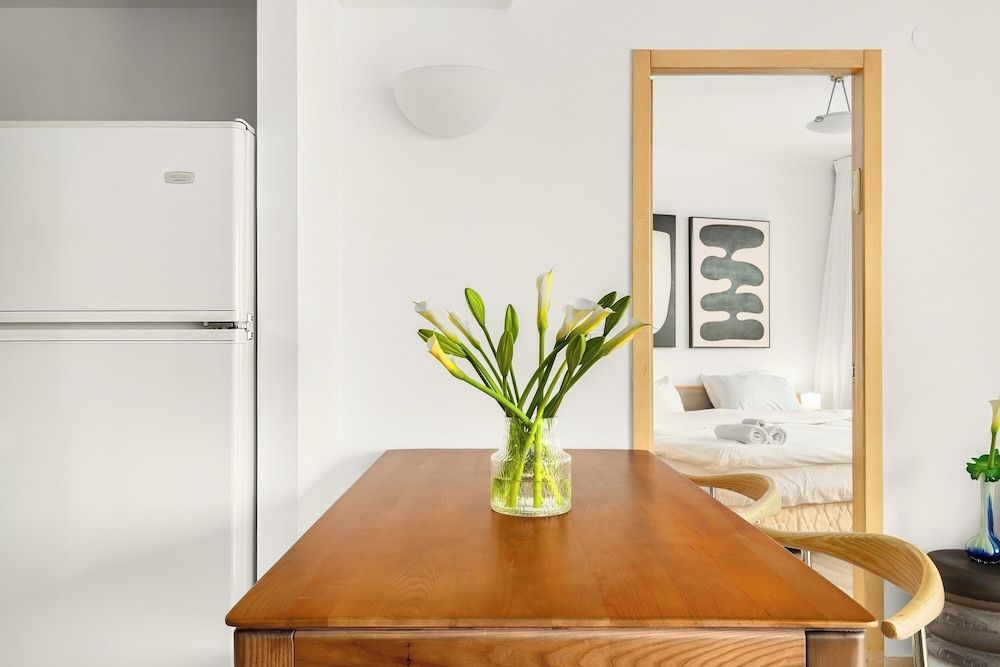 Beachfront with Balcony and Pool Access Apartment 23