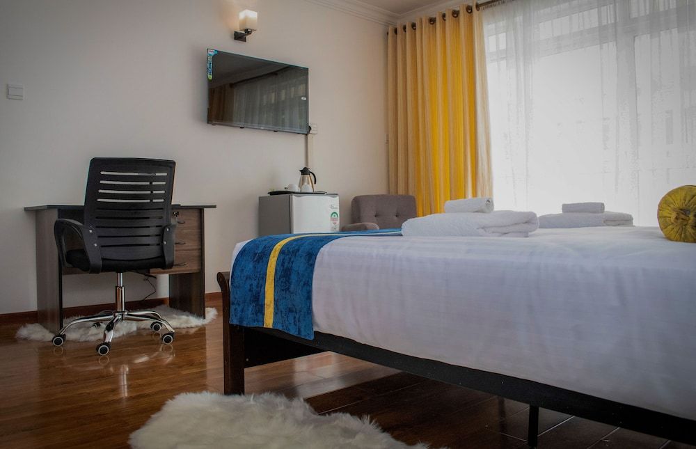 undefined Luxel Suites by Homes by Della 7