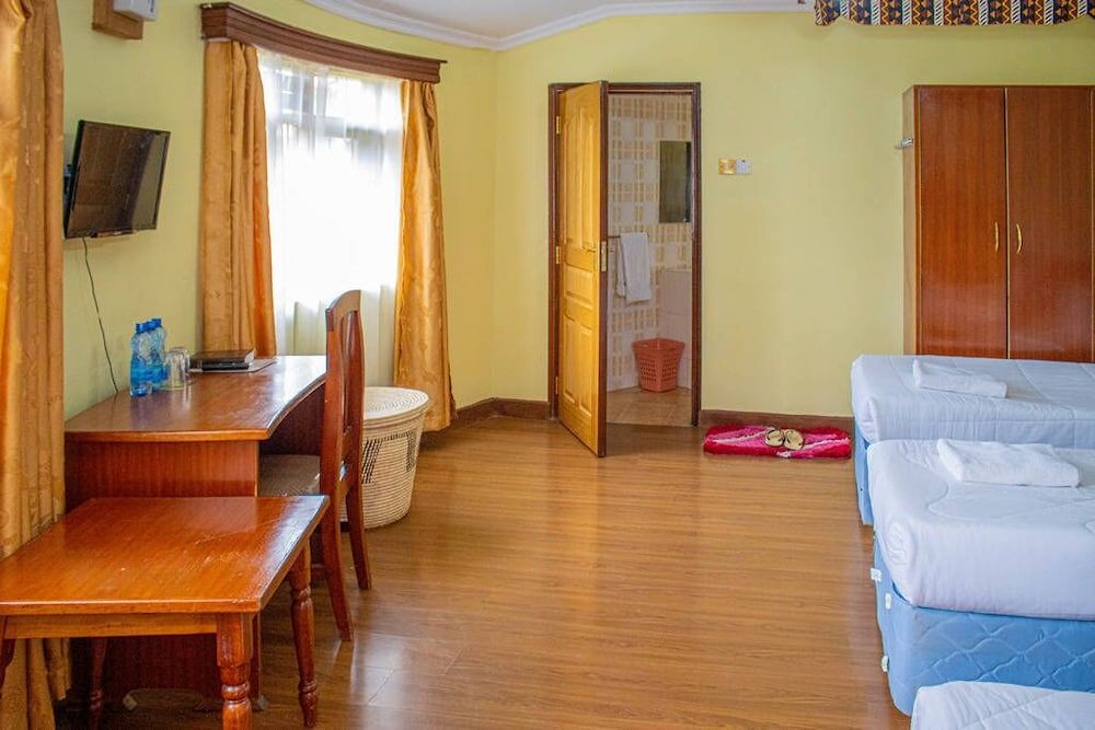 Tumaini Cottages & Conference Centre Comfort Triple Room 4