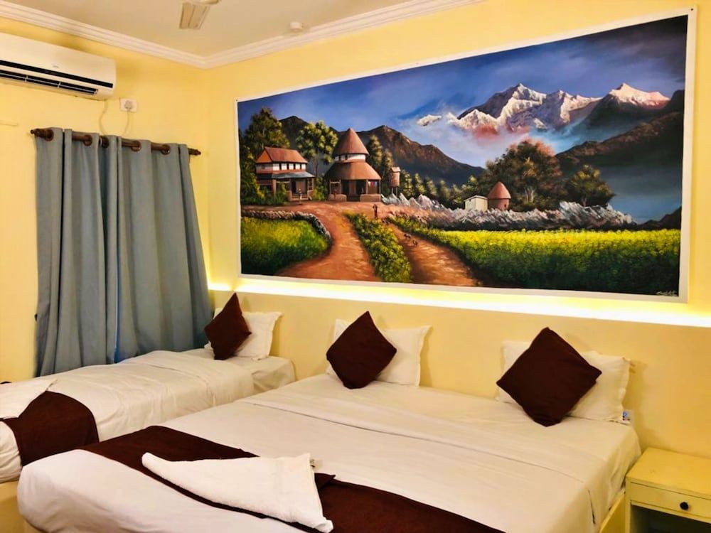 Hotel Peaceland Lumbini Standard Triple Room 2