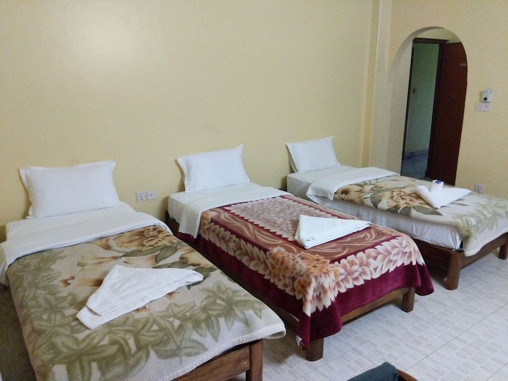 The Mountain House Deluxe Triple Room 2