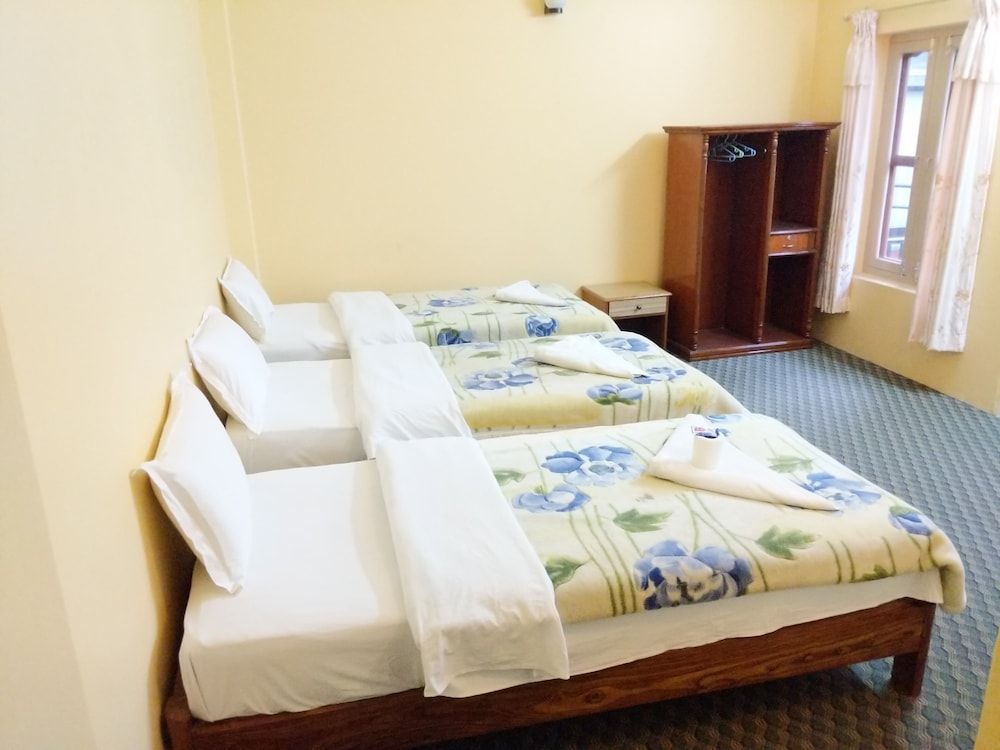 The Mountain House Deluxe Triple Room 3