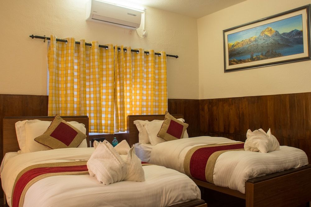 Deluxe Quadruple Room, Multiple Beds, Garden View