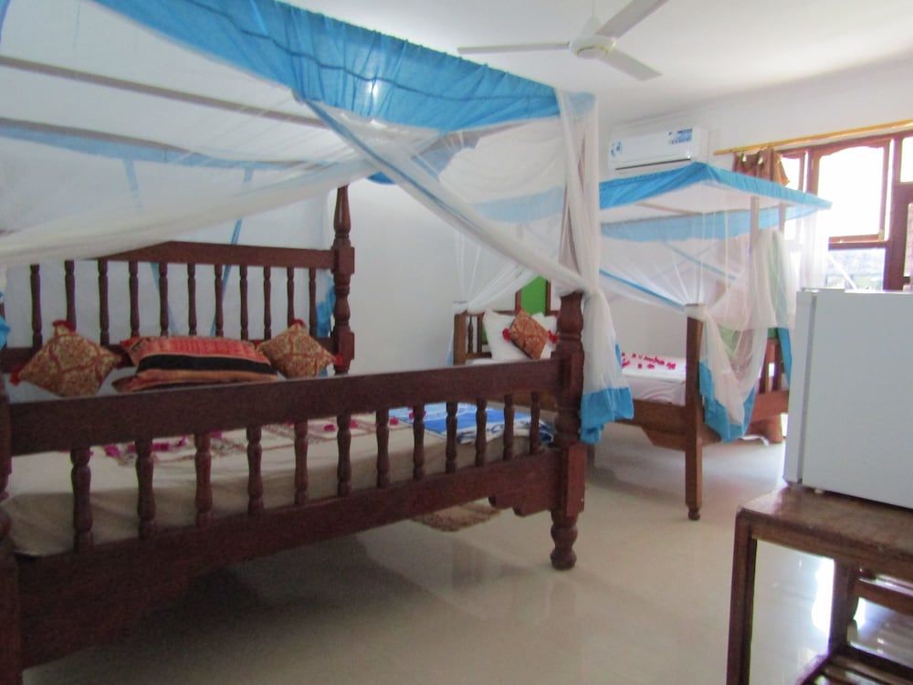 Deluxe Quadruple Room, Air conditioning, Garden View
