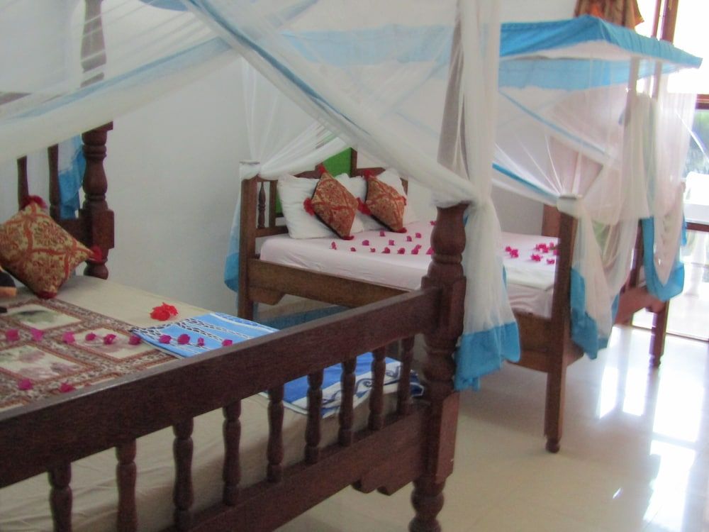 Deluxe Quadruple Room, Air conditioning, Garden View