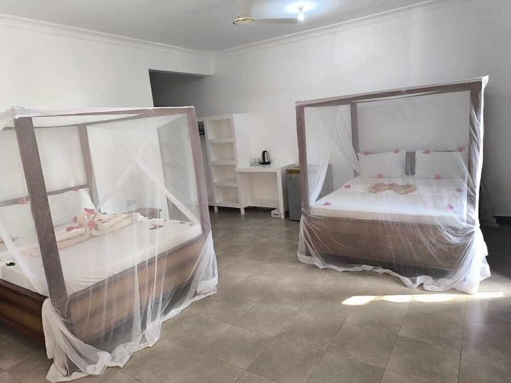 Majani Breeze Standard Twin Room with Balcony and Garden View 2